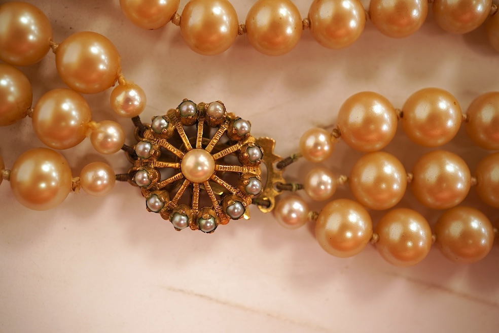 Two cultured pearl necklaces, each composed of a single row of cultured pearls, one with pearls 3-7mm diameter, length 44cm, clasp stamped 9CT; the other with pearls approximately 6mm diameter, length 86cm, clasp with Br